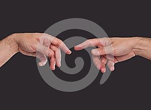 Two hands about to touch