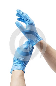 Two hands wearing nitrile gloves on a white background