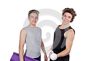 Two handsome guys doing fitness workout with weights isolated on white background