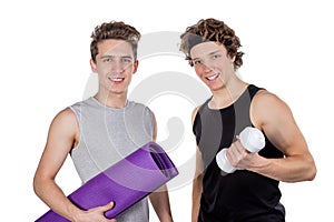 Two handsome guys doing fitness workout with weights isolated on white background