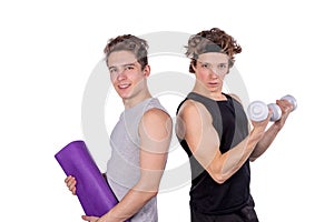 Two handsome guys doing fitness workout with weights isolated on white background