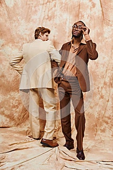 Two handsome multicultural men in elegant
