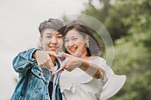 Two happy Asian lesbian couple in love