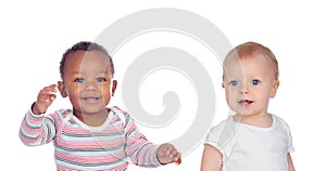 Two happy babies of different races