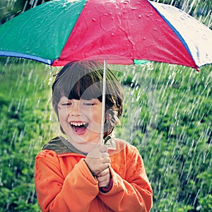 Two happy brother with umbrella