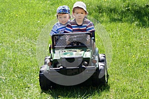 Two happy brothers in car