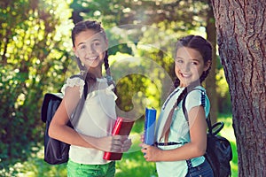 Two happy children back to school to learning