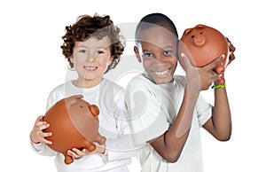 Two happy children with moneybox savings photo