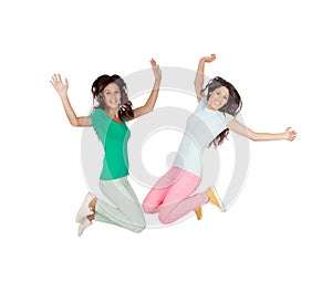 Two happy excited young women jumping