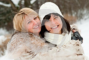 Two happy middle-aged women