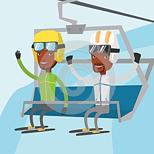 Two happy skiers using cableway at ski resort.