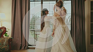 Two Happy women dancing spinning in classic room fun joy joyful smiling face Fairy tale bride adult girls beauty noble