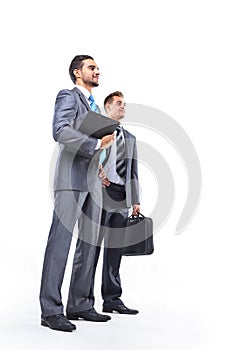 Two happy young businessmen full body