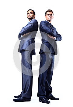 Two happy young businessmen full body