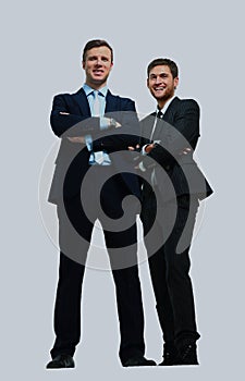Two happy young businessmen full body, isolated on white. photo
