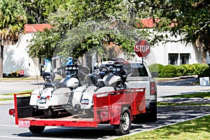 Two Harleys on Red Pickup