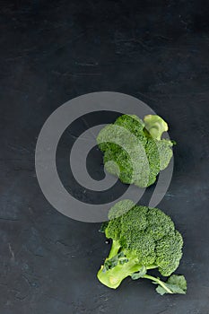 Two heads of healthy salad. fresh, raw green broccoli. the view from the top green vegetable flower. healthy diet. copy space.
