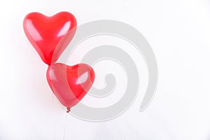 Two heart shaped balloons