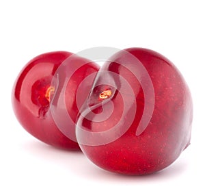 Two heart shaped cherry berries