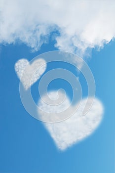 Two heart shaped clouds