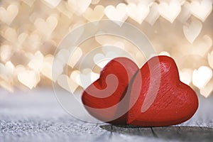 Two hearts on bokeh background