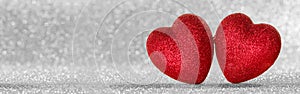 Two hearts on bokeh background