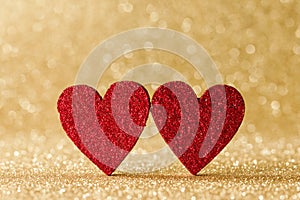 Two hearts on bokeh background