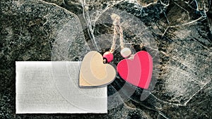 Two hearts on broken ice. Tablet for text. Mockup. Valentine`s Day.