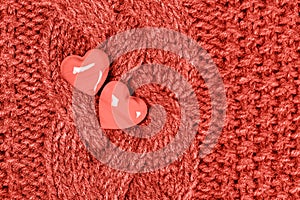 Two hearts knitted wool texture Valentines Day background