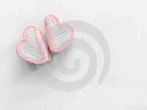 Two hearts marshmallows closeup, Pink marshmallow close up background, Sweets in the form of hearts of marshmallow