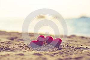 Two hearts on the summer beach