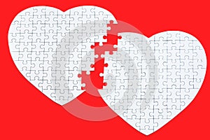 Two hearts of white puzzles, incomplete transition from one heart to another, love, together photo