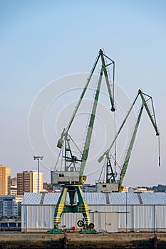 Two heavy cranes for loading merchant ships