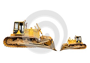 Two heavy dirty building bulldozers of yellow color: big and small, isolated.