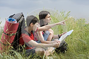 Two hikers with the map