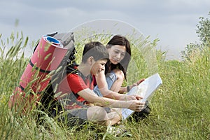 Two hikers with the map
