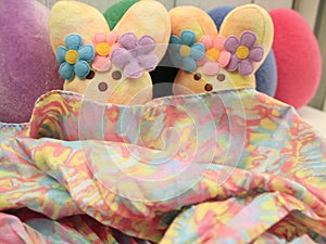 two hippie Easter peeps with pastel blanket