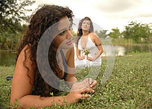 Two hippies in the grass