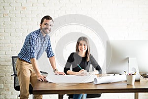 Two Hispanic architects working