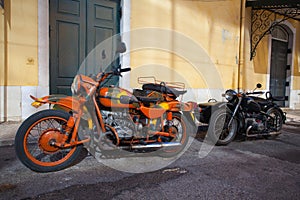 Two historic motorcycle with sidecar