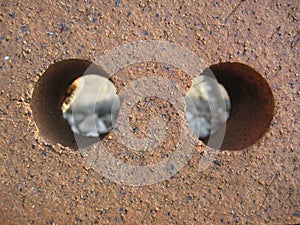 Two Holes in Brick Abstract