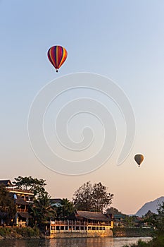 Two Hot Air Balloons against blue sky