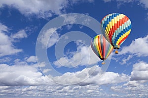 Two Hot Air Balloons In The Beautiful Blue Sky