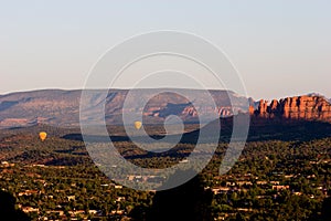 Two hot air balloons over the valley of Sedona, Arizona