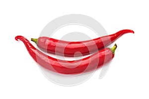 Two hot chili peppers isolated on white background