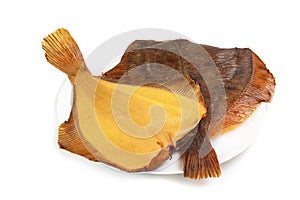 Two hot smoked flatfish on plate