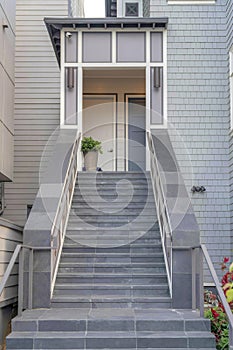 Two houses exterior with stone tiles staircase at San Francisco, California