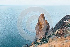 Two huge stones in the middle of the sea.