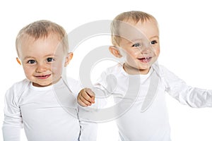 Two identical twins on a white isolated background