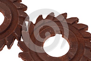 Two incredible rusty chocolate gears